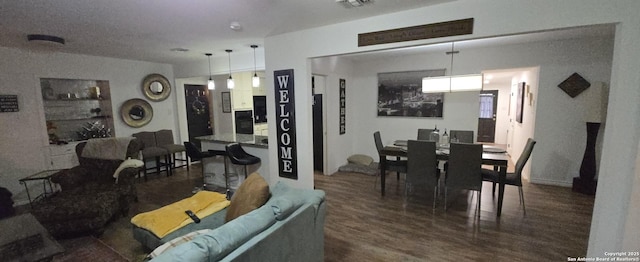 living room featuring dark hardwood / wood-style floors