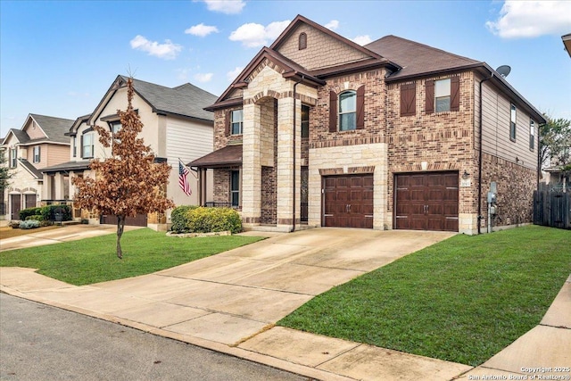 view of front of home featuring a garage and a front yard