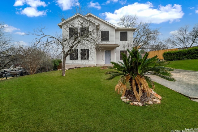 view of front of home with a front lawn