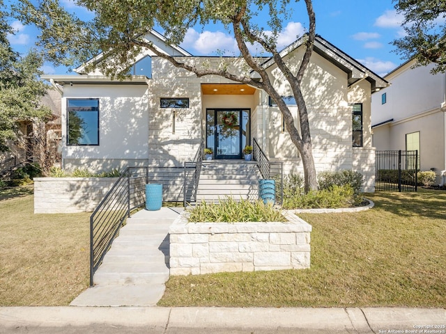 view of front facade with a front lawn