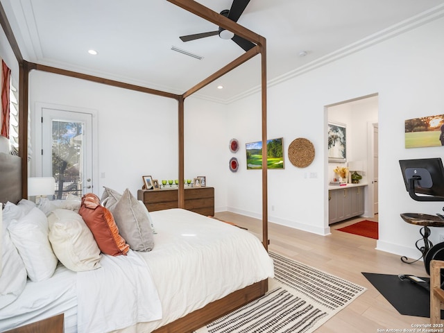 bedroom with crown molding, light hardwood / wood-style flooring, ceiling fan, access to exterior, and ensuite bathroom