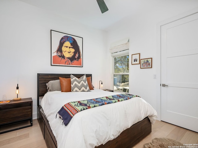 bedroom featuring ceiling fan and light wood-type flooring