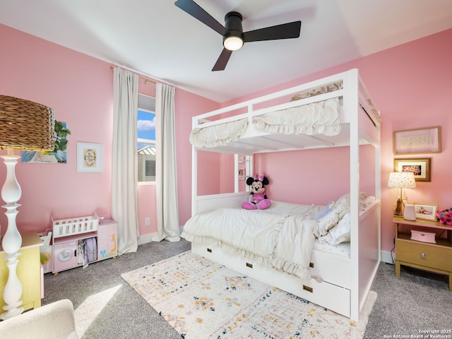 bedroom with ceiling fan and carpet flooring