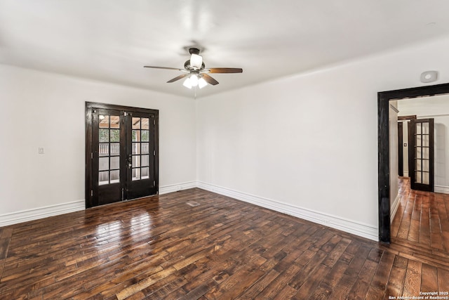 spare room featuring dark wood-type flooring, french doors, and ceiling fan