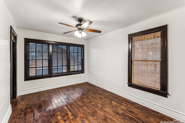 unfurnished room featuring ceiling fan and hardwood / wood-style floors