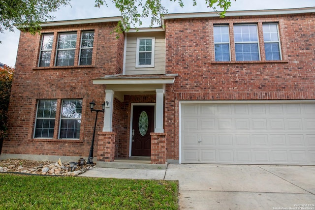 view of front of property featuring a garage