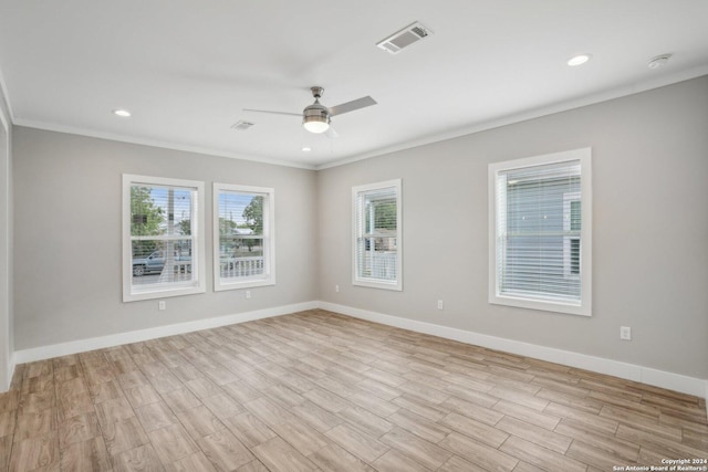 unfurnished room with crown molding, light hardwood / wood-style flooring, and ceiling fan