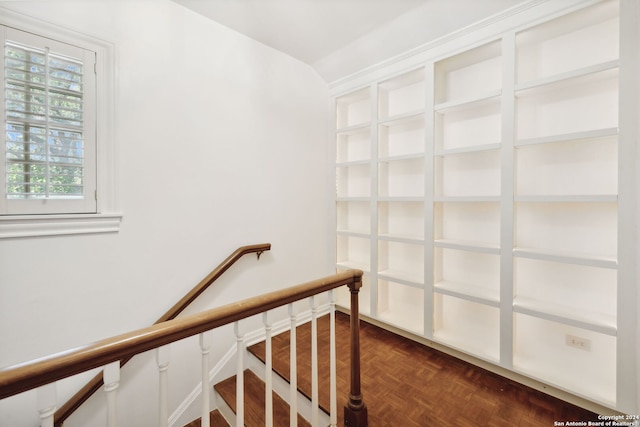 stairway with parquet flooring