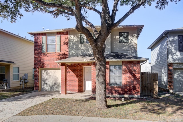 front of property with a garage