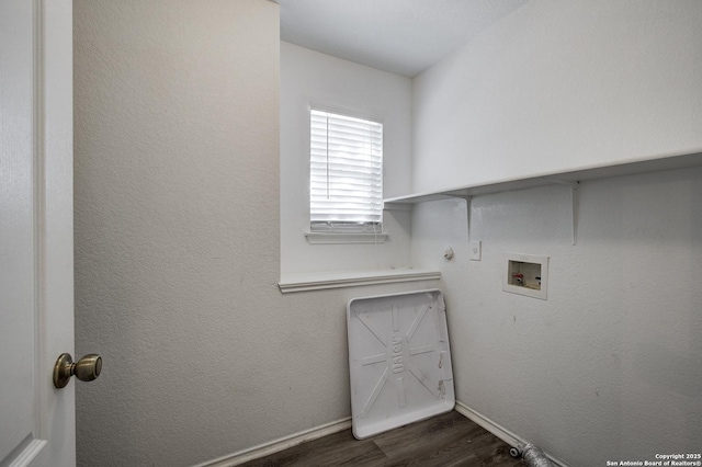 laundry area with washer hookup, hookup for a gas dryer, and dark wood-type flooring