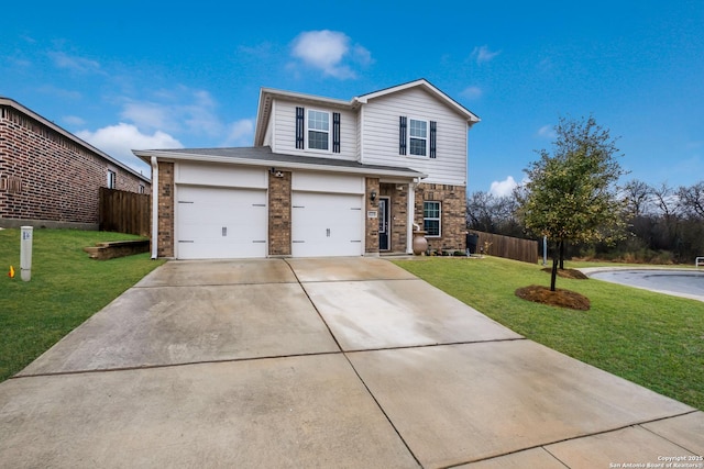 traditional-style house with driveway, brick siding, a front lawn, and fence