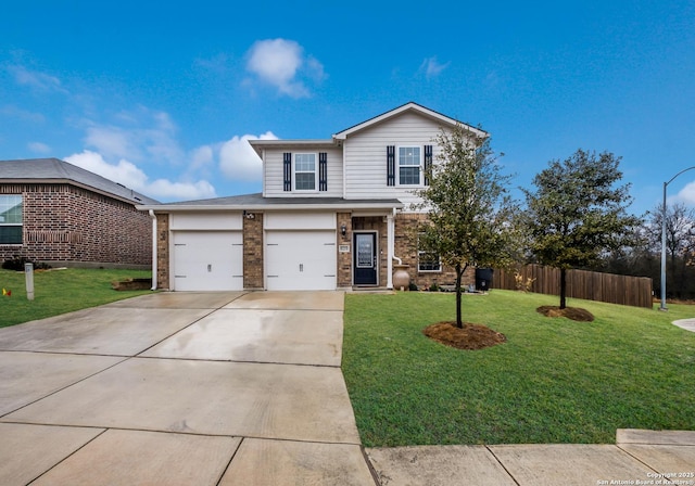 traditional-style house with brick siding, concrete driveway, a front lawn, and fence