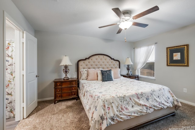 bedroom with carpet flooring, a ceiling fan, and baseboards