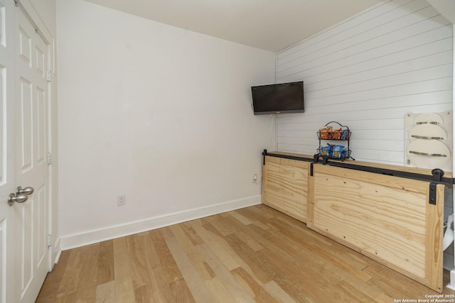 unfurnished bedroom featuring hardwood / wood-style floors