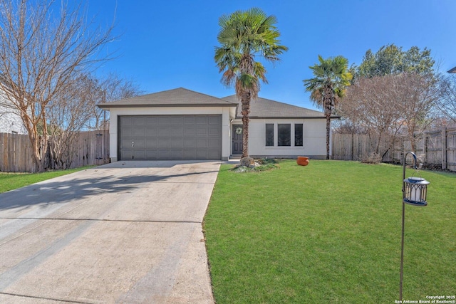 ranch-style house featuring a garage and a front lawn