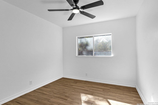 spare room featuring ceiling fan and hardwood / wood-style floors