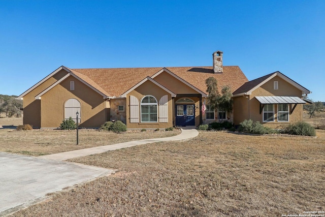 single story home with a front yard