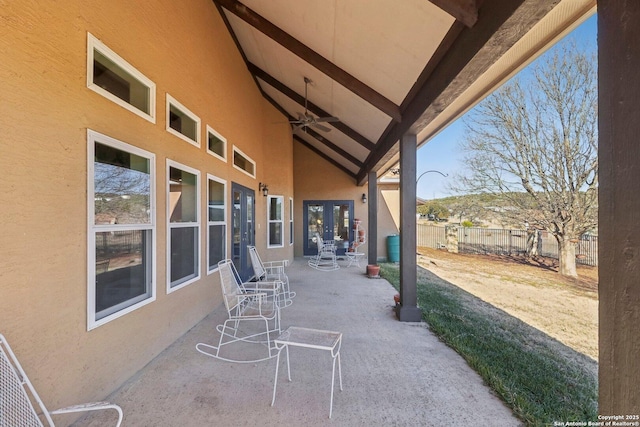 view of patio featuring ceiling fan