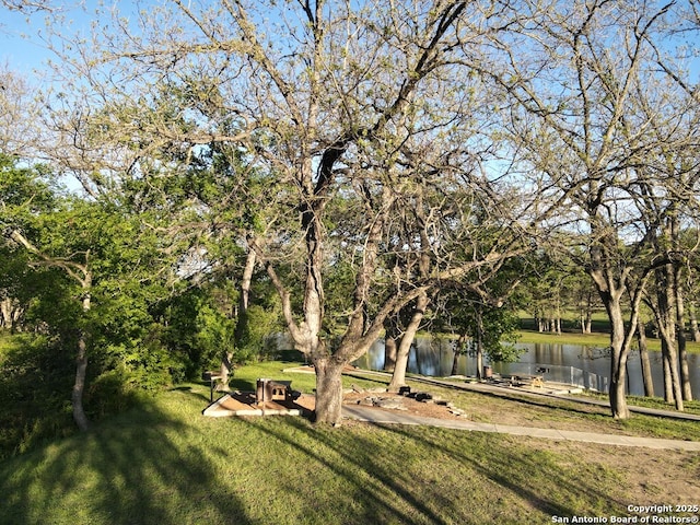 view of yard with a water view