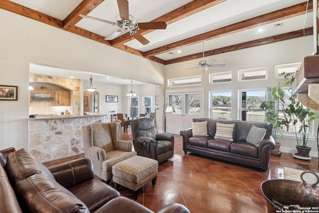 tiled living room with a high ceiling, ceiling fan with notable chandelier, and beam ceiling