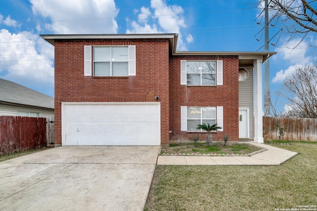 view of front of home with a garage and a front lawn