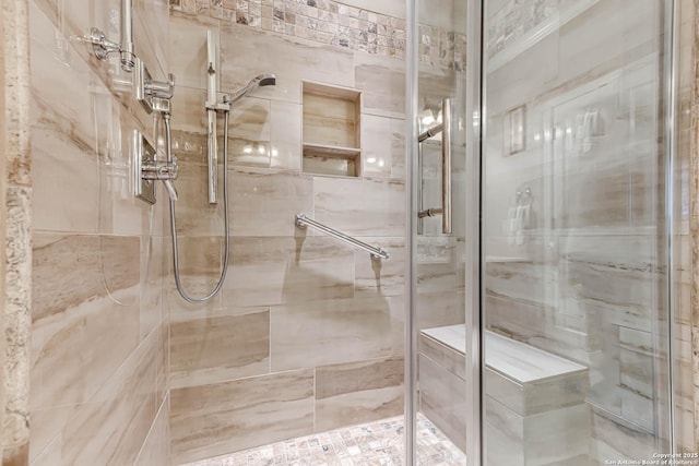 bathroom featuring an enclosed shower