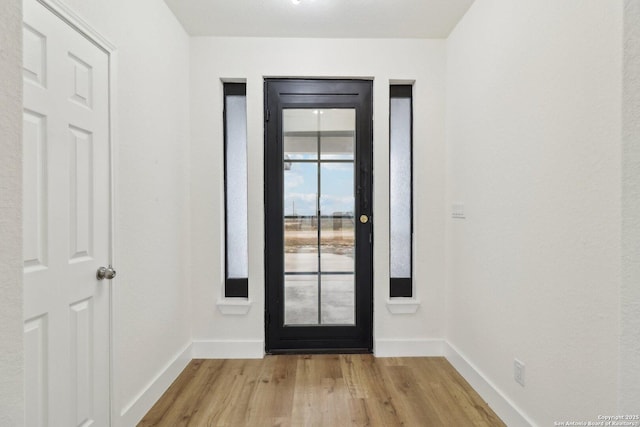 entrance foyer featuring light wood-type flooring