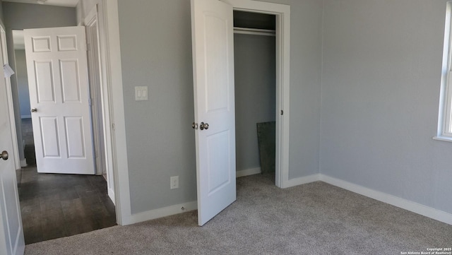 unfurnished bedroom with carpet floors