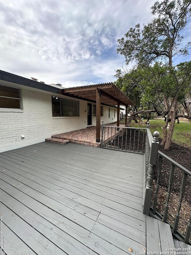 wooden deck with a pergola