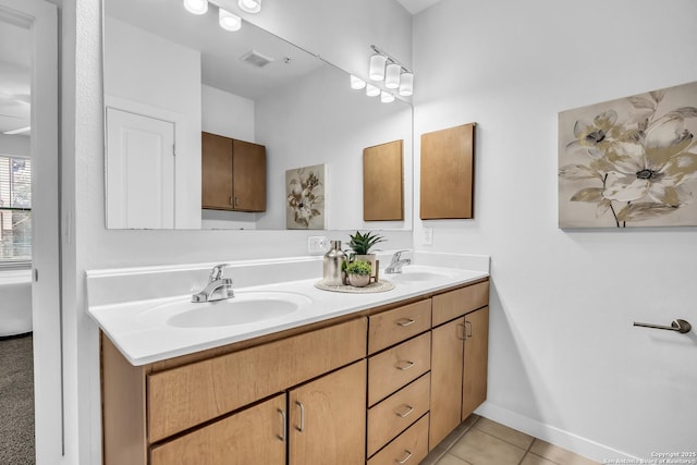 bathroom featuring vanity and tile patterned floors