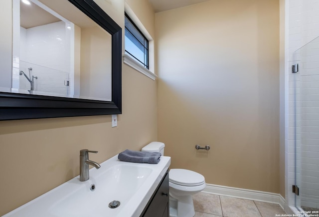 bathroom with an enclosed shower, sink, tile patterned floors, and toilet