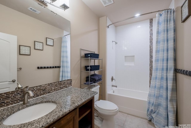 full bathroom with shower / tub combo with curtain, tile patterned floors, toilet, vanity, and backsplash