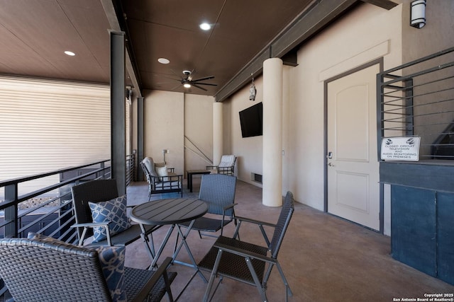 balcony featuring ceiling fan