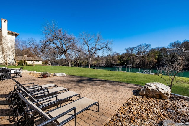 view of patio / terrace featuring a water view