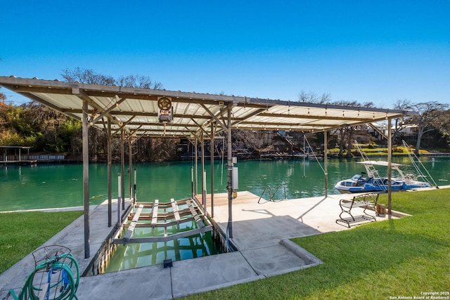 view of dock with a water view and a yard