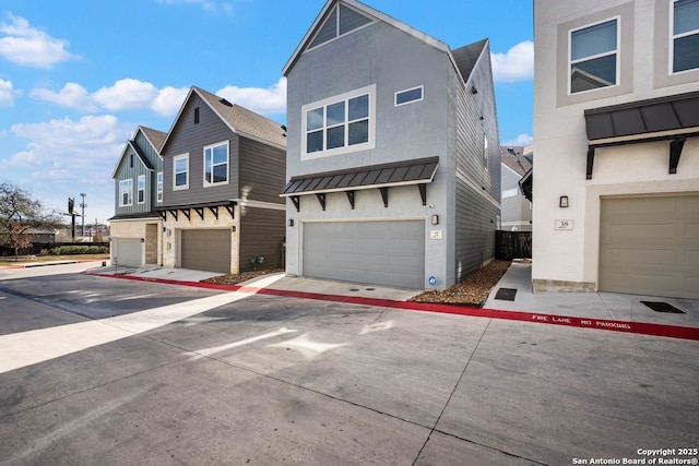 multi unit property featuring a garage