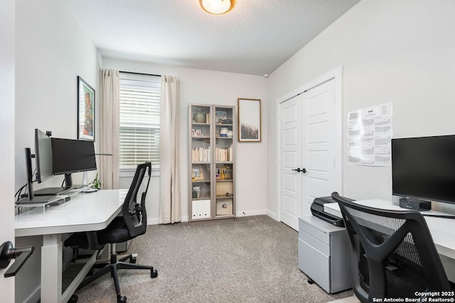 view of carpeted office space