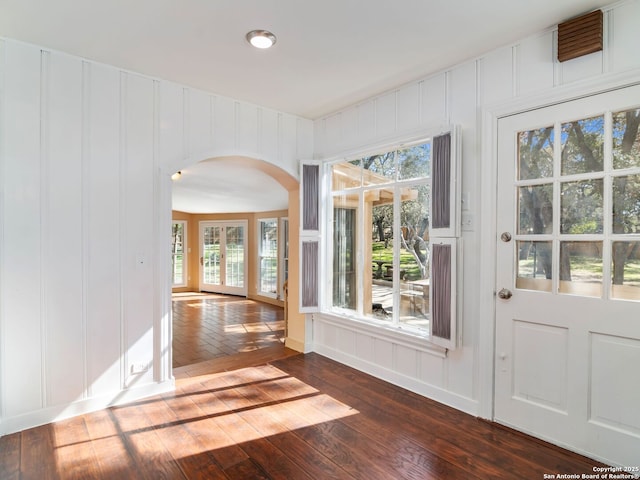 interior space with dark hardwood / wood-style floors