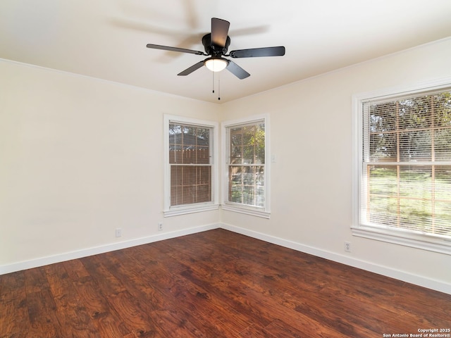 unfurnished room with hardwood / wood-style floors, crown molding, and ceiling fan