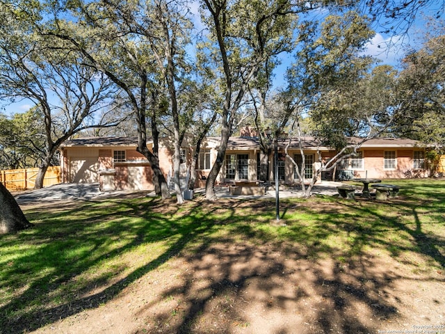 view of front of property with a front lawn