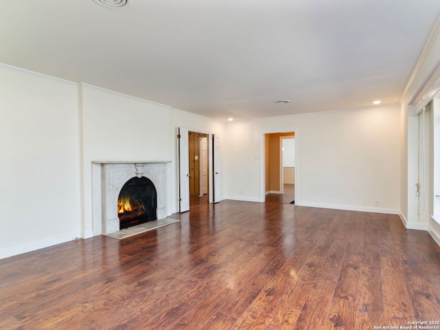 unfurnished living room with dark hardwood / wood-style floors