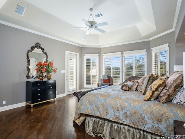 bedroom featuring access to outside, ornamental molding, dark hardwood / wood-style flooring, a raised ceiling, and ceiling fan