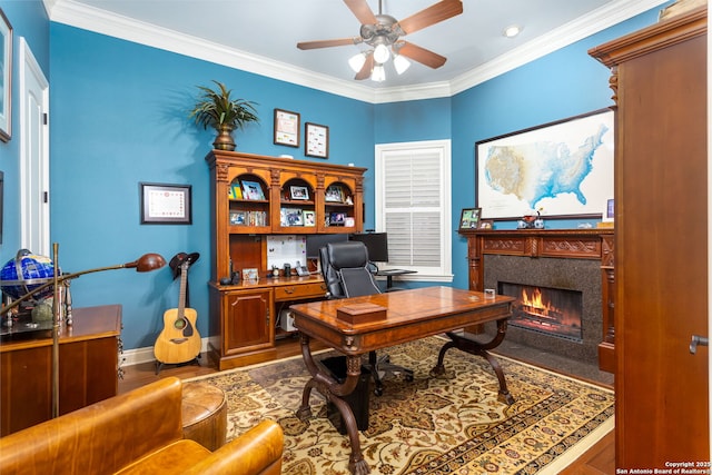 office area featuring hardwood / wood-style flooring, crown molding, and ceiling fan