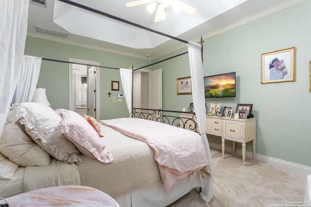 bedroom featuring crown molding, light colored carpet, and ceiling fan