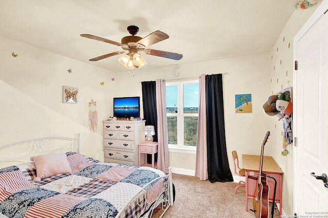 bedroom with light colored carpet and ceiling fan