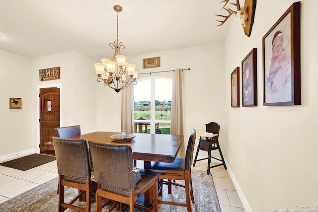 tiled dining space with an inviting chandelier