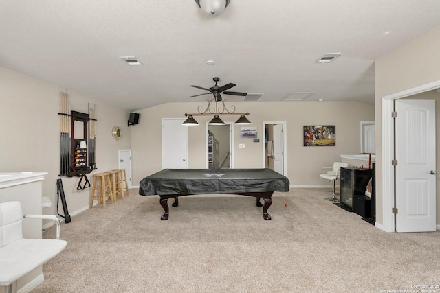 game room featuring vaulted ceiling, light colored carpet, pool table, ceiling fan, and a textured ceiling