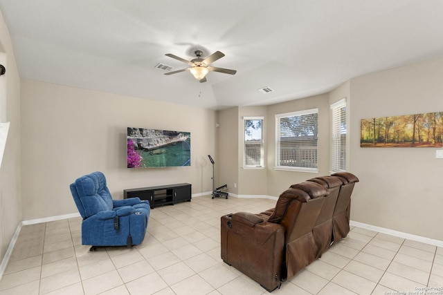 living room with light tile patterned floors and ceiling fan