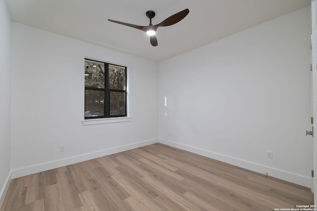 unfurnished room with ceiling fan and light wood-type flooring