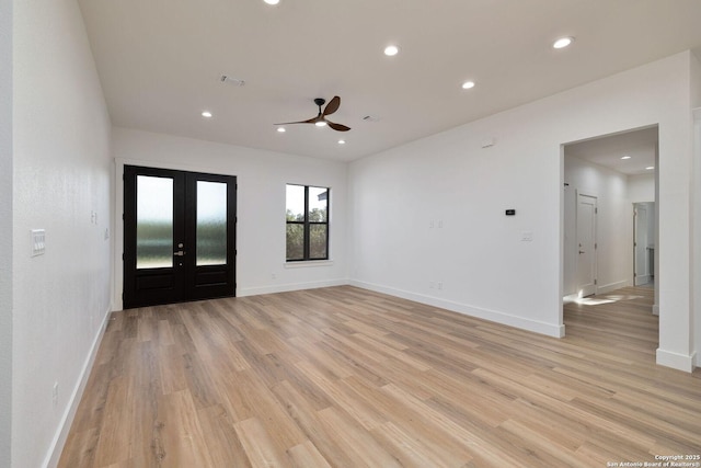 interior space featuring french doors, ceiling fan, and light hardwood / wood-style flooring